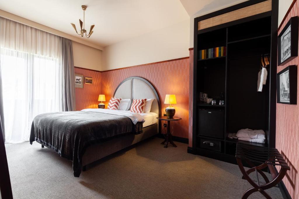 Postel nebo postele na pokoji v ubytování Communal Hotel Kutaisi