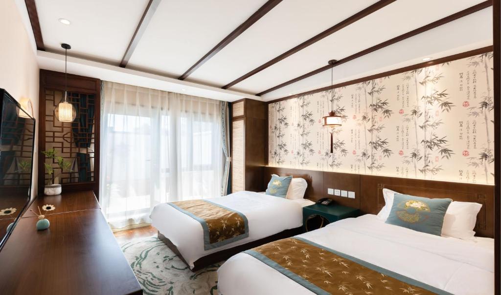 Chinese Culture Boutique Hotel-Tangfu,Traditional Chinese Theme,Heart of Beijing,Near Forbidden City,Tiananmen Square,Hutongs,Metro Access,Free Coffee,tea,Laundry客房内的一张或多张床位