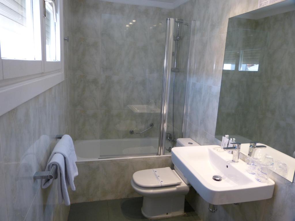 Koupelna v ubytování Hotel Avenida