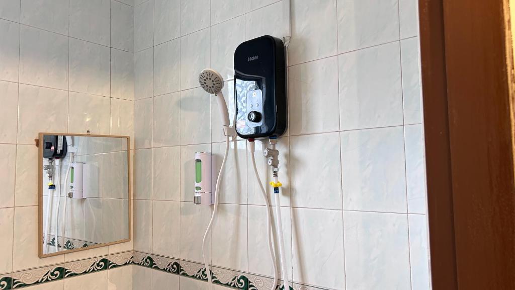 Koupelna v ubytování NEW Xing Yue Hotel 星悦自助酒店