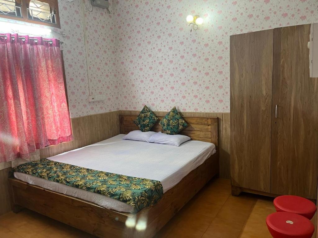 Postel nebo postele na pokoji v ubytování Amazing Homestay