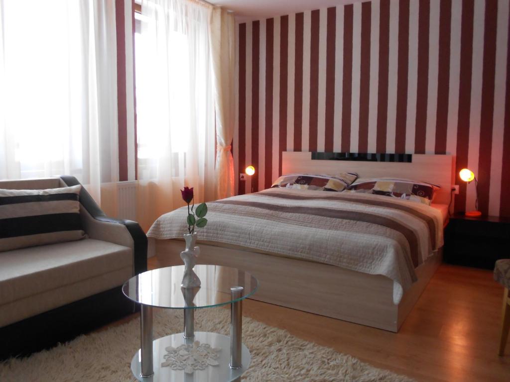 Postel nebo postele na pokoji v ubytování Guest House Tsenovi