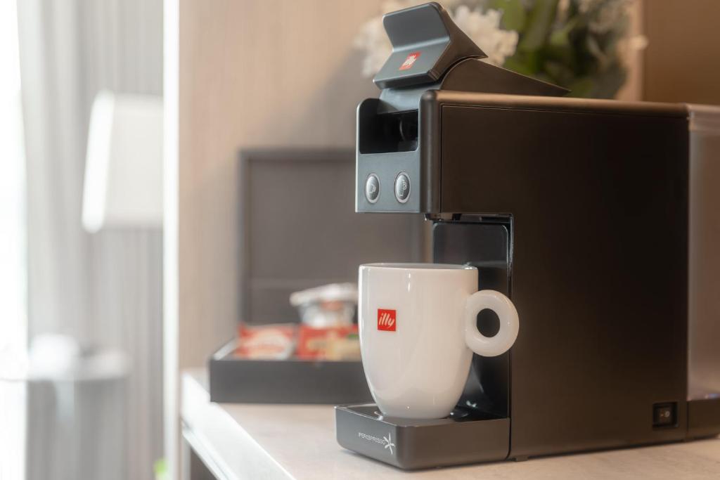 Coffee and tea making facilities at ALVA HOTEL BY ROYAL