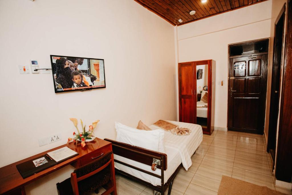Postel nebo postele na pokoji v ubytování Keys Hotel