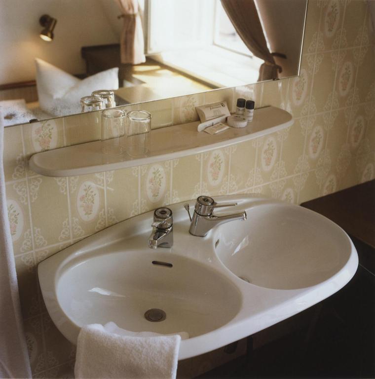 Koupelna v ubytování Hotel Jedermann