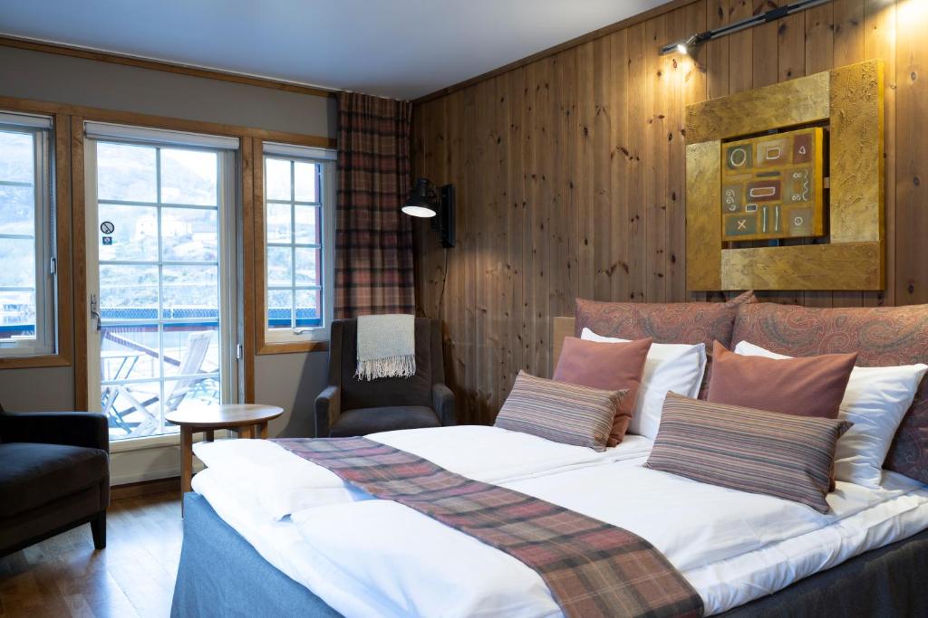 Postel nebo postele na pokoji v ubytování Flåmsbrygga Hotel