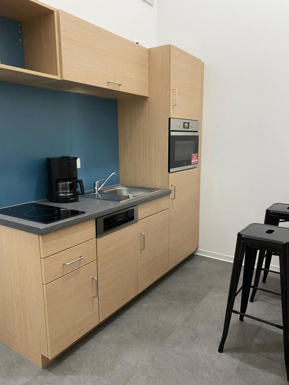 Kuchyň nebo kuchyňský kout v ubytování Fabella Flats Forchheim