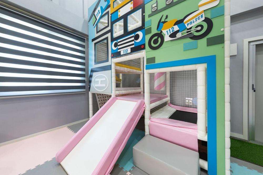 Postel nebo postele na pokoji v ubytování Gyeongju Haneul Kids Pool Villa