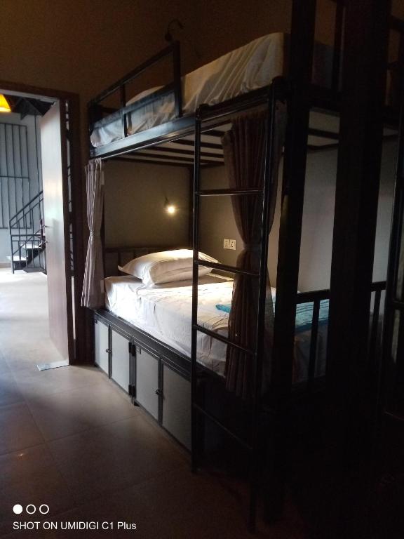 Postel nebo postele na pokoji v ubytování Hostel FUJI