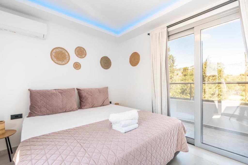 Postel nebo postele na pokoji v ubytování M&B Luxury Villa
