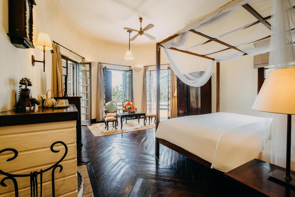 Postel nebo postele na pokoji v ubytování Ana Mandara Villas Dalat Resort & Spa