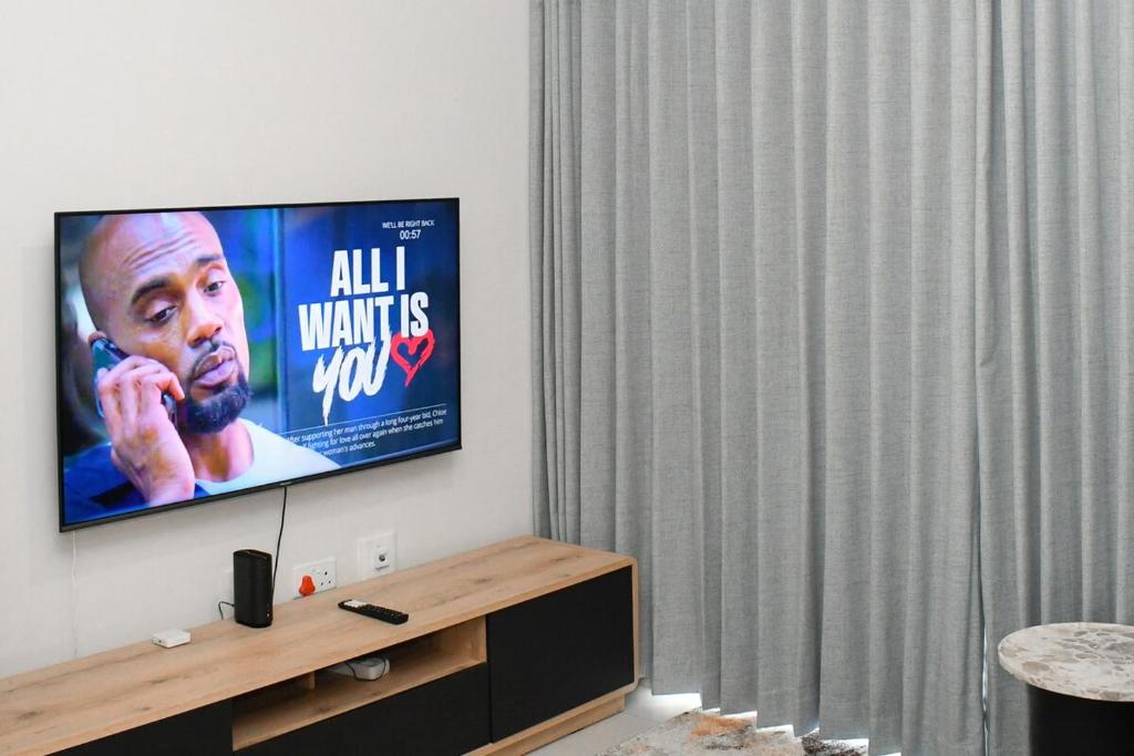 TV a/nebo společenská místnost v ubytování Sarona Kappa C107