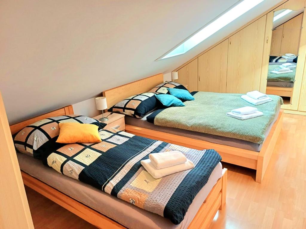 Letto o letti in una camera di Penzion Laterna