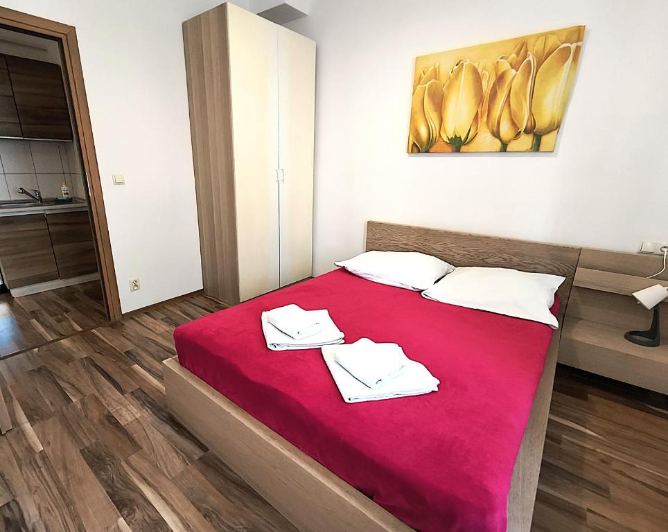 Posteľ alebo postele v izbe v ubytovaní Apartament Premium