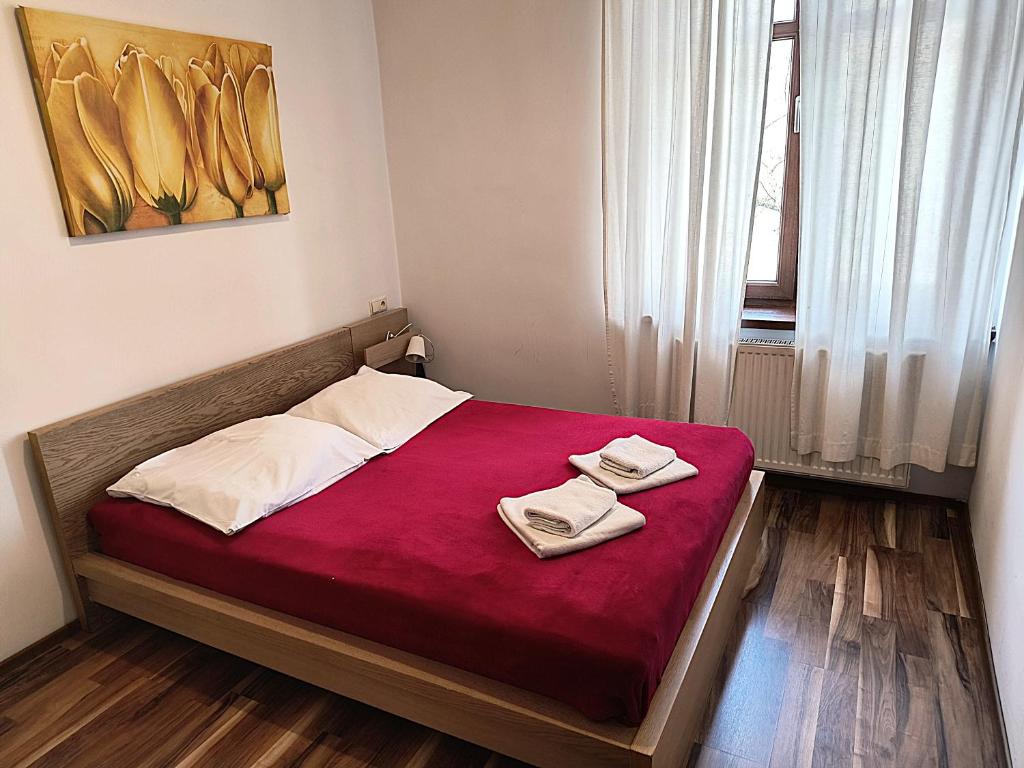 Posteľ alebo postele v izbe v ubytovaní Apartament Premium