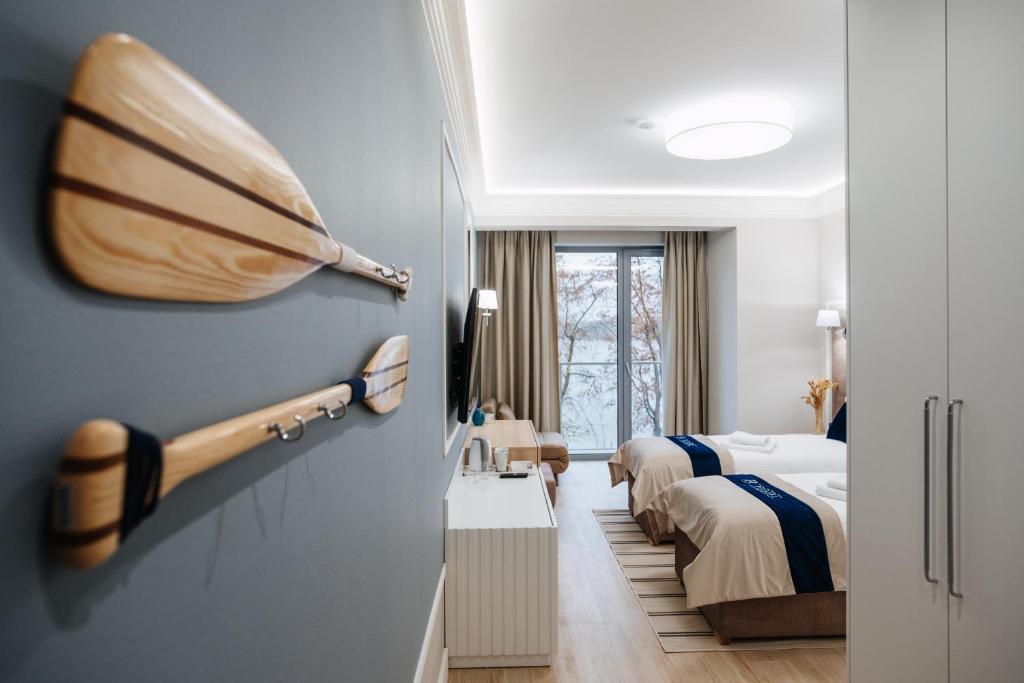 Postel nebo postele na pokoji v ubytování Pulaski Residence