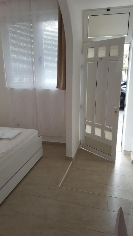 Postel nebo postele na pokoji v ubytování Rooms Valentino