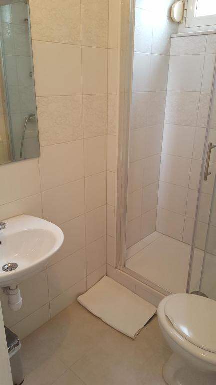 Koupelna v ubytování Rooms Valentino