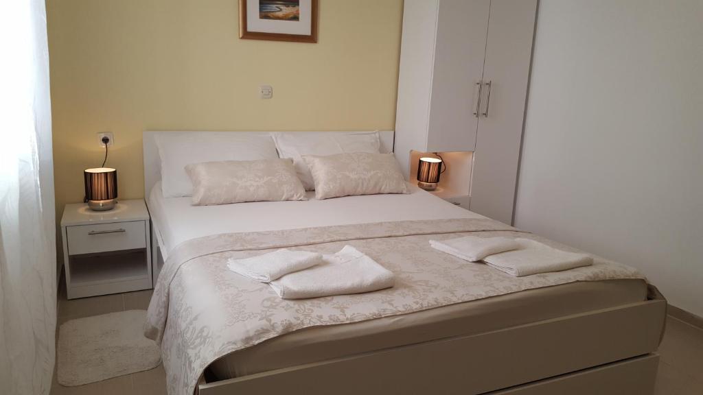 Postel nebo postele na pokoji v ubytování Rooms Valentino
