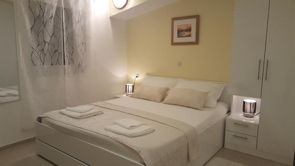 Postel nebo postele na pokoji v ubytování Rooms Valentino