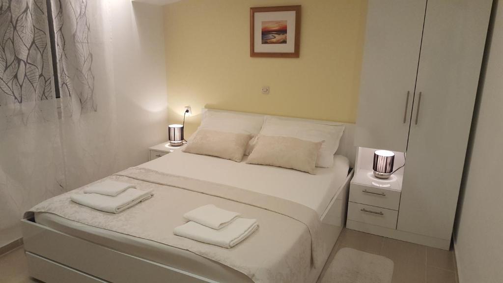 Postel nebo postele na pokoji v ubytování Rooms Valentino