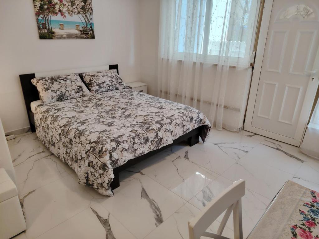 Posteľ alebo postele v izbe v ubytovaní Studio-apartman Ella