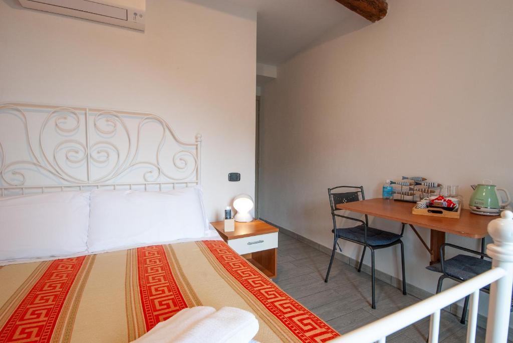 Postel nebo postele na pokoji v ubytování Volo Rooms by Arbaspàa