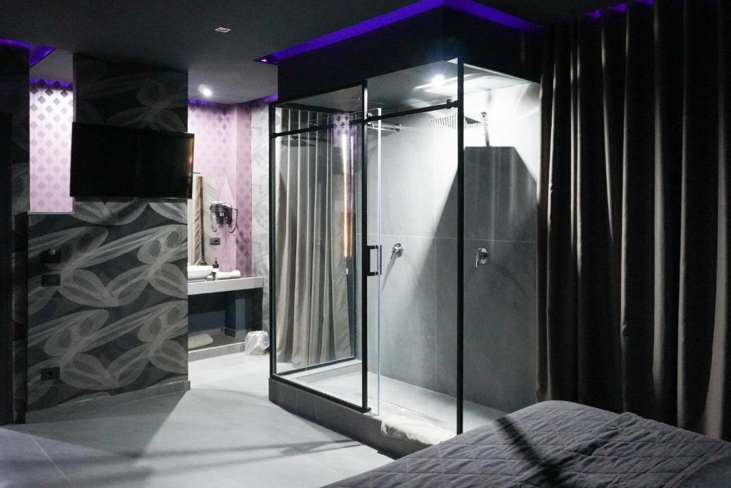 Postel nebo postele na pokoji v ubytování Hotel El Pamas