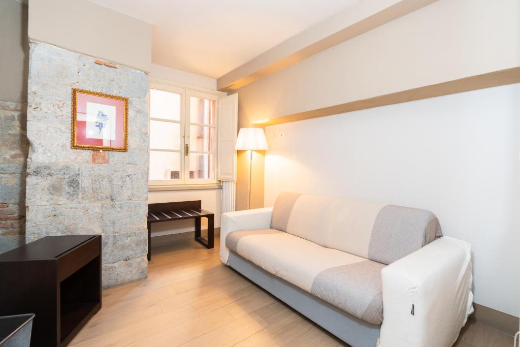 A seating area at Borgo Suite Apartment
