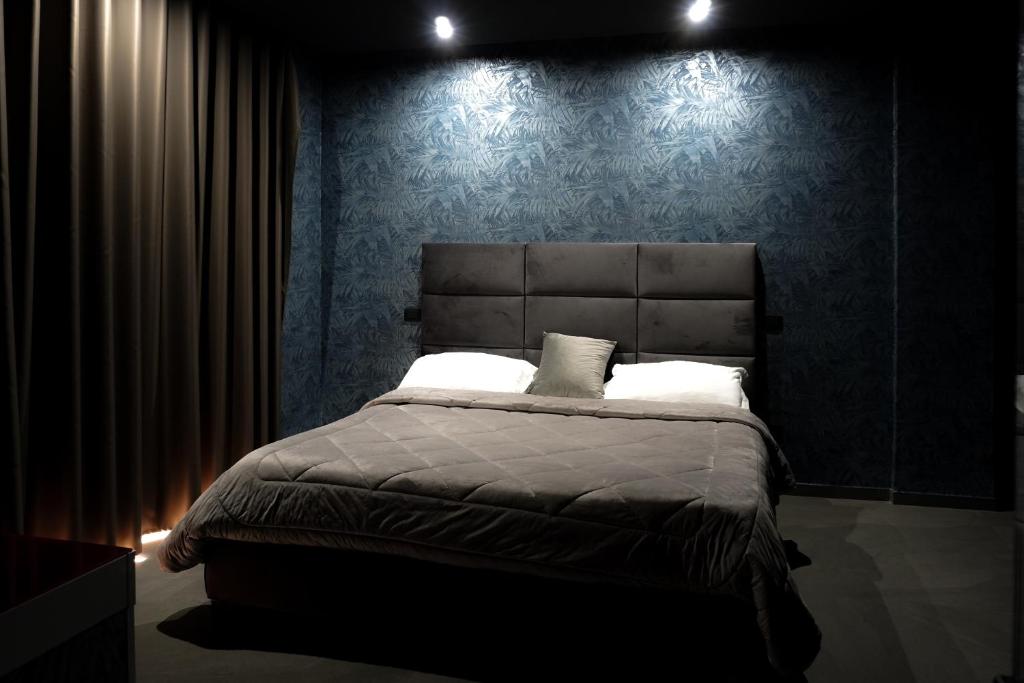 Postel nebo postele na pokoji v ubytování Hotel El Pamas