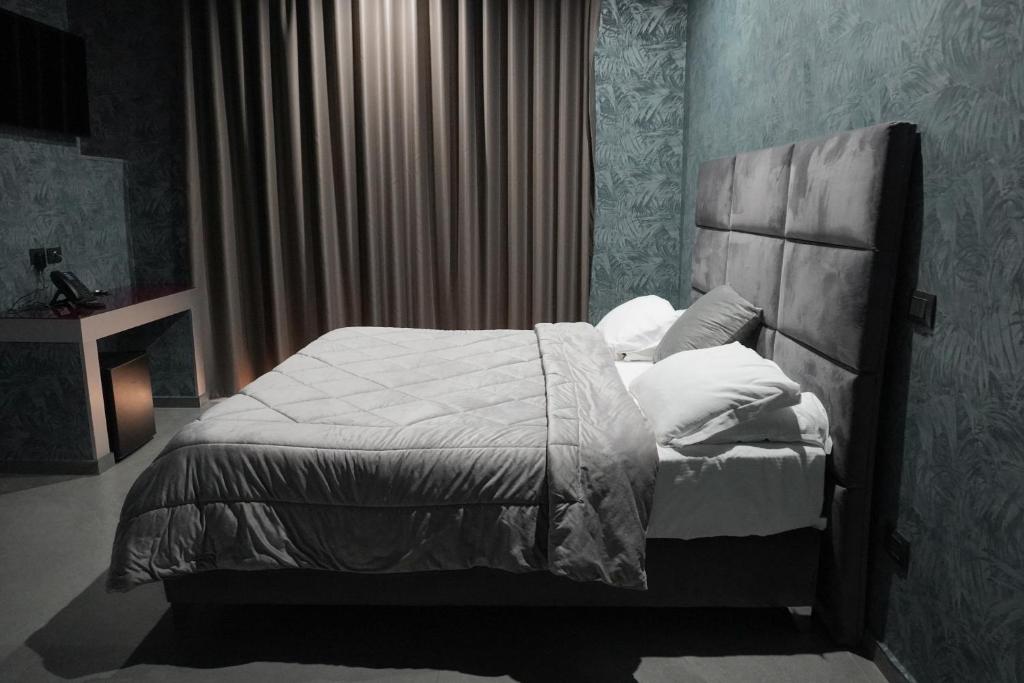Postel nebo postele na pokoji v ubytování Hotel El Pamas