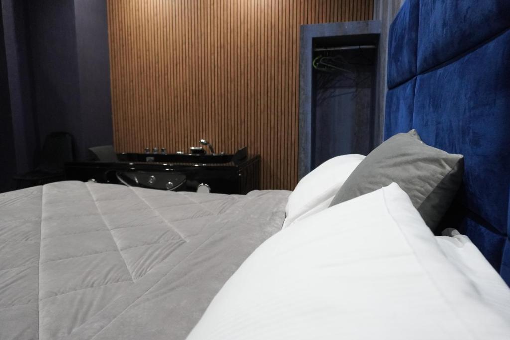 Postel nebo postele na pokoji v ubytování Hotel El Pamas