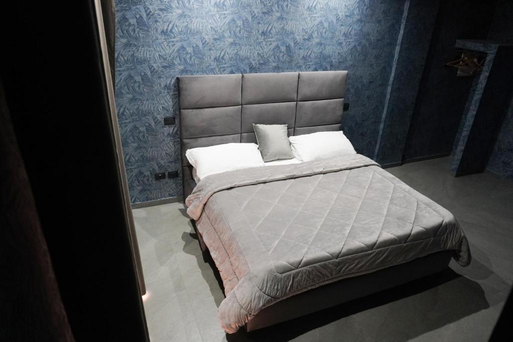 Postel nebo postele na pokoji v ubytování Hotel El Pamas