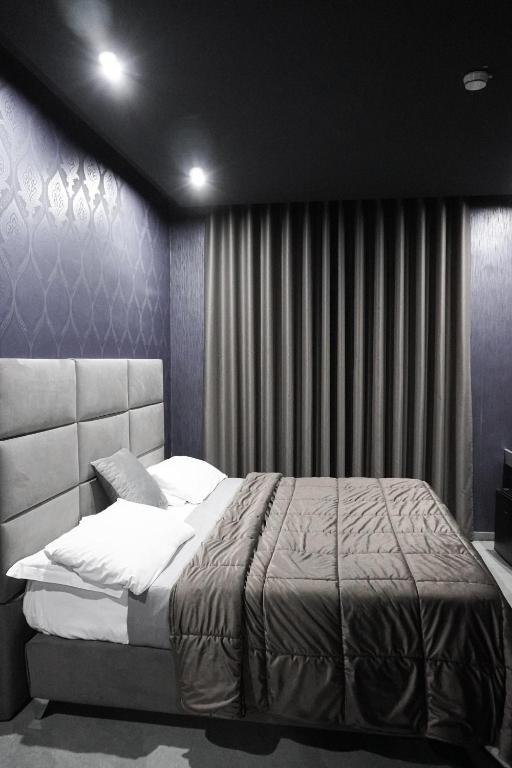 Postel nebo postele na pokoji v ubytování Hotel El Pamas
