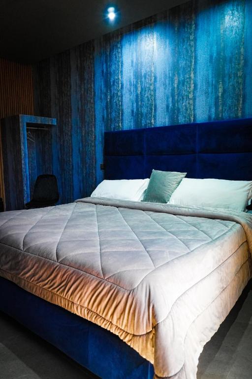 Postel nebo postele na pokoji v ubytování Hotel El Pamas