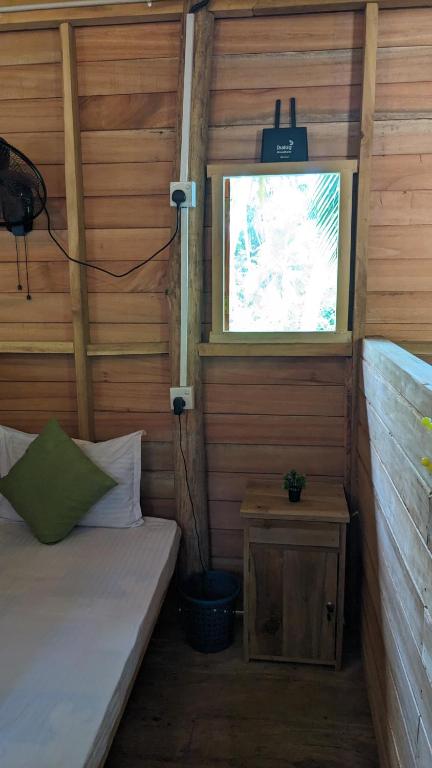 Postel nebo postele na pokoji v ubytování Ocean bliss hiriketiya