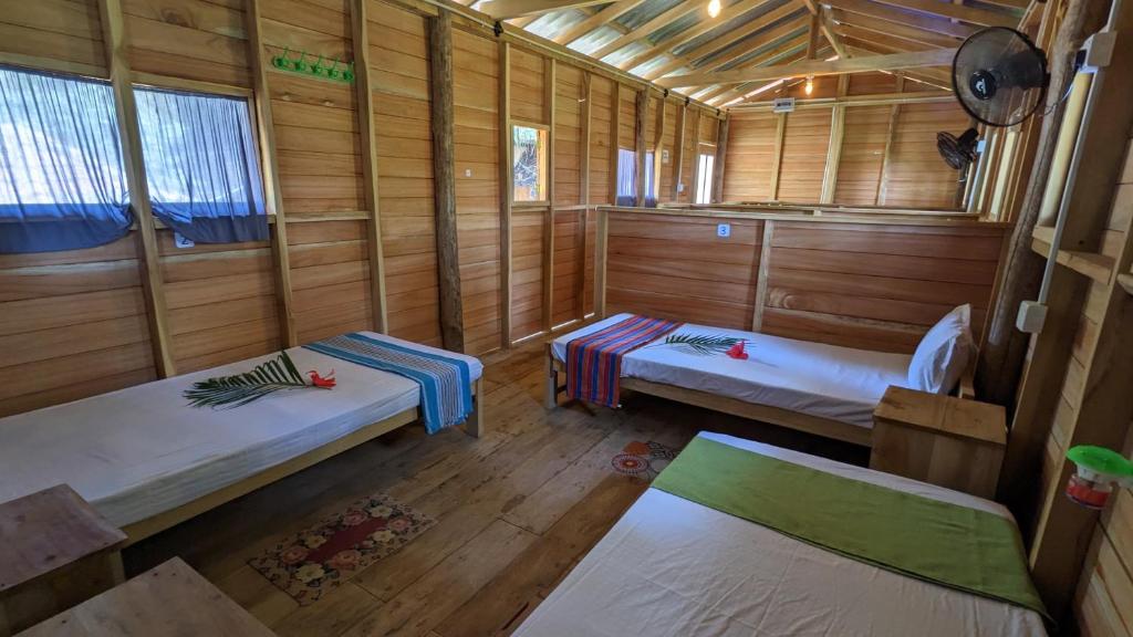 Postel nebo postele na pokoji v ubytování Ocean bliss hiriketiya