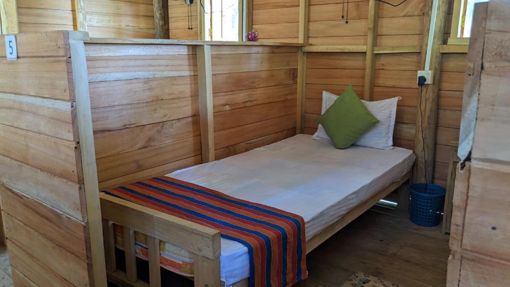 Postel nebo postele na pokoji v ubytování Ocean bliss hiriketiya