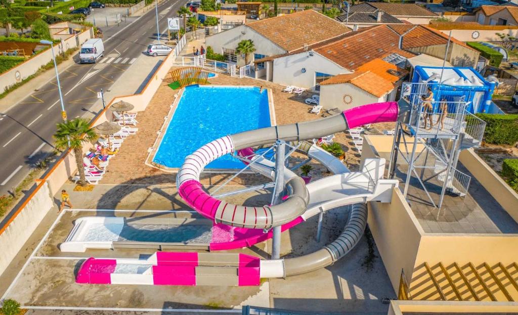 an aerial view of a water slide at a water park at ZEcamping parc aquatique pet friendly club enfant in Saint-Jean-de-Monts