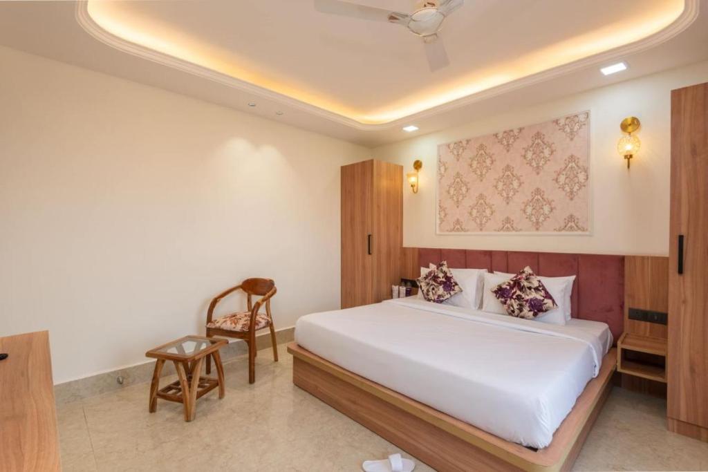 Postel nebo postele na pokoji v ubytování Aatithyam Residency-Golf Course Road Gurgaon