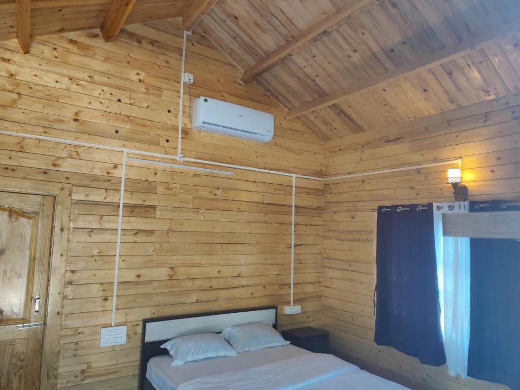 Postel nebo postele na pokoji v ubytování Nature Trinket Retrea