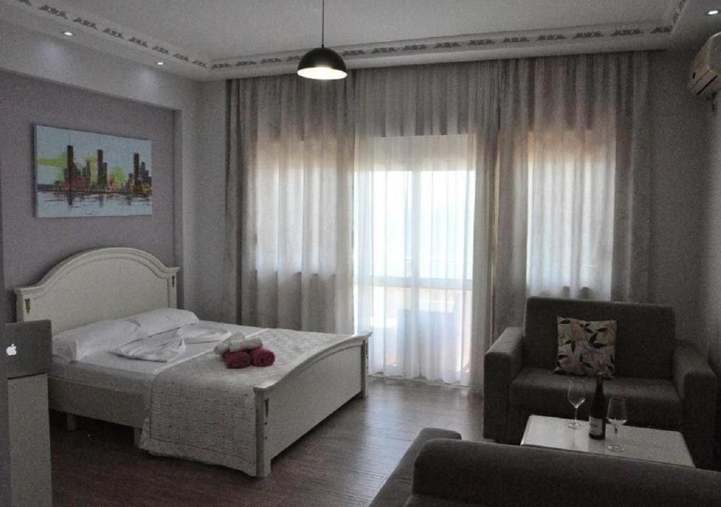 Postel nebo postele na pokoji v ubytování Hotel Maren Durres