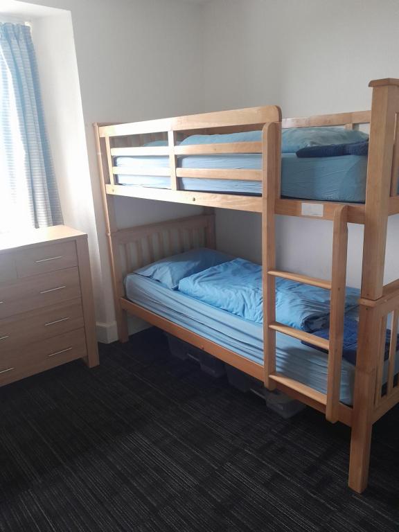 Postel nebo postele na pokoji v ubytování Torrin Bunkhouse