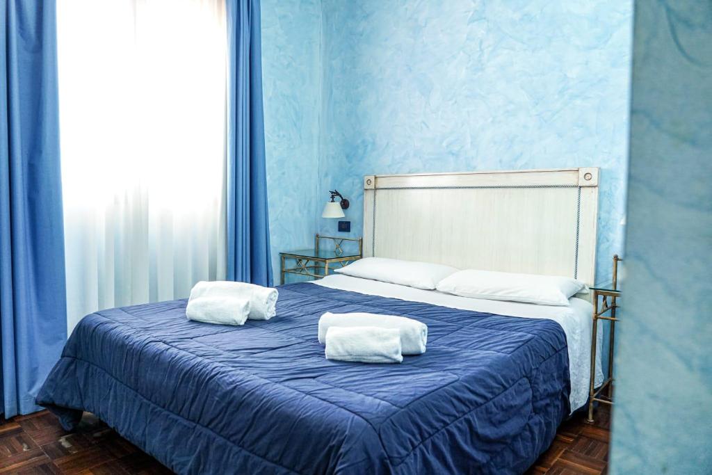 Postel nebo postele na pokoji v ubytování Motel - Hotel Nautico Pozzallo