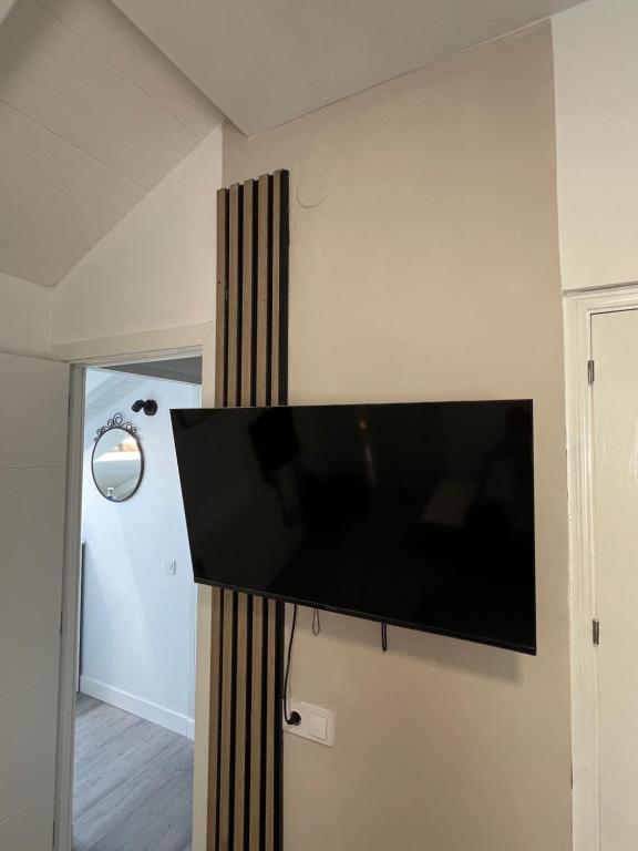 Et tv og/eller underholdning på Costa Azul Appartamento