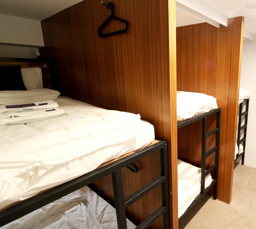 Postel nebo postele na pokoji v ubytování Daan Park Hotel