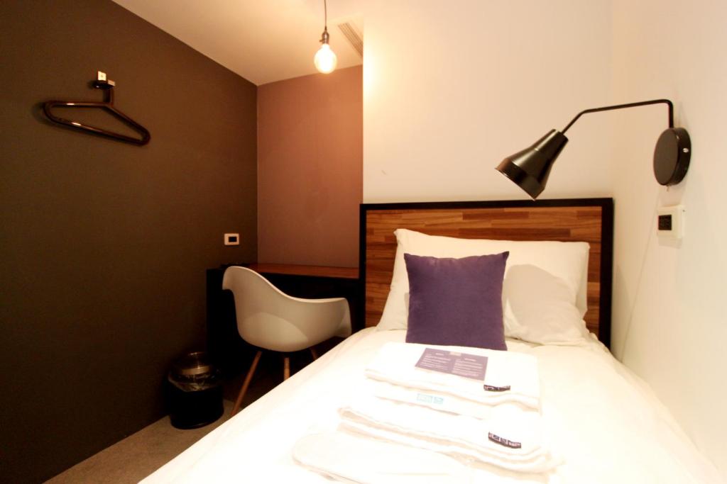 Postel nebo postele na pokoji v ubytování Daan Park Hotel