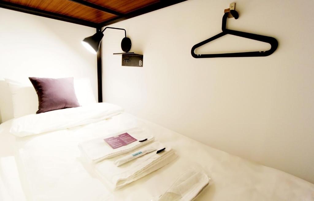 Postel nebo postele na pokoji v ubytování Daan Park Hotel