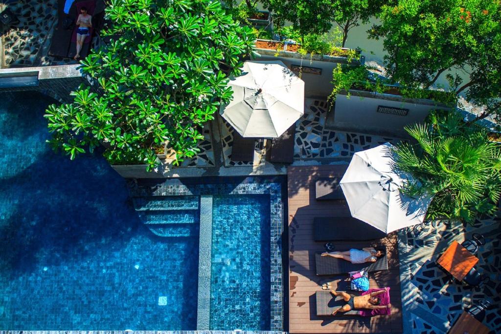 Bazén v ubytování Mazi Design Hotel by Kalima nebo v jeho okolí