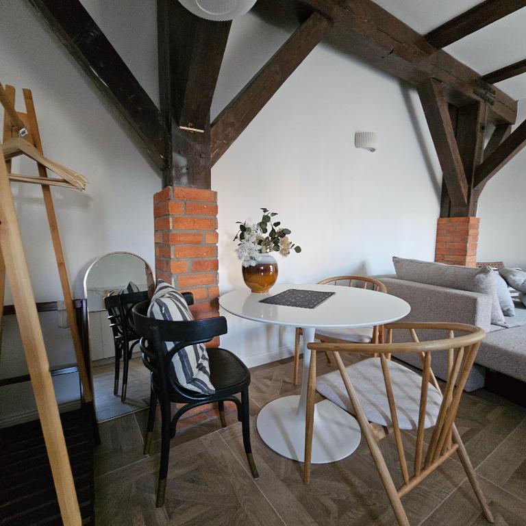 Posezení v ubytování Krzywa Apartamenty